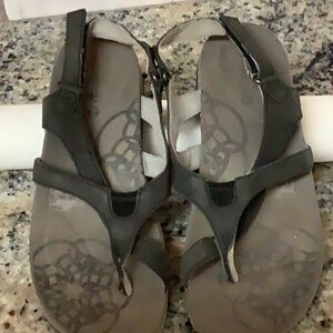 Black leather size 8 Merrell sandals.  Great sole for walking or hiking .